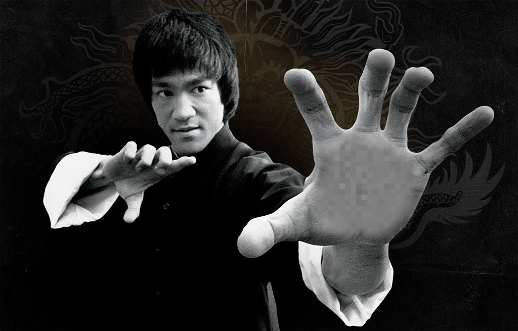 Sua foto na mão de Bruce Lee fazendo uma pose do karaté ..